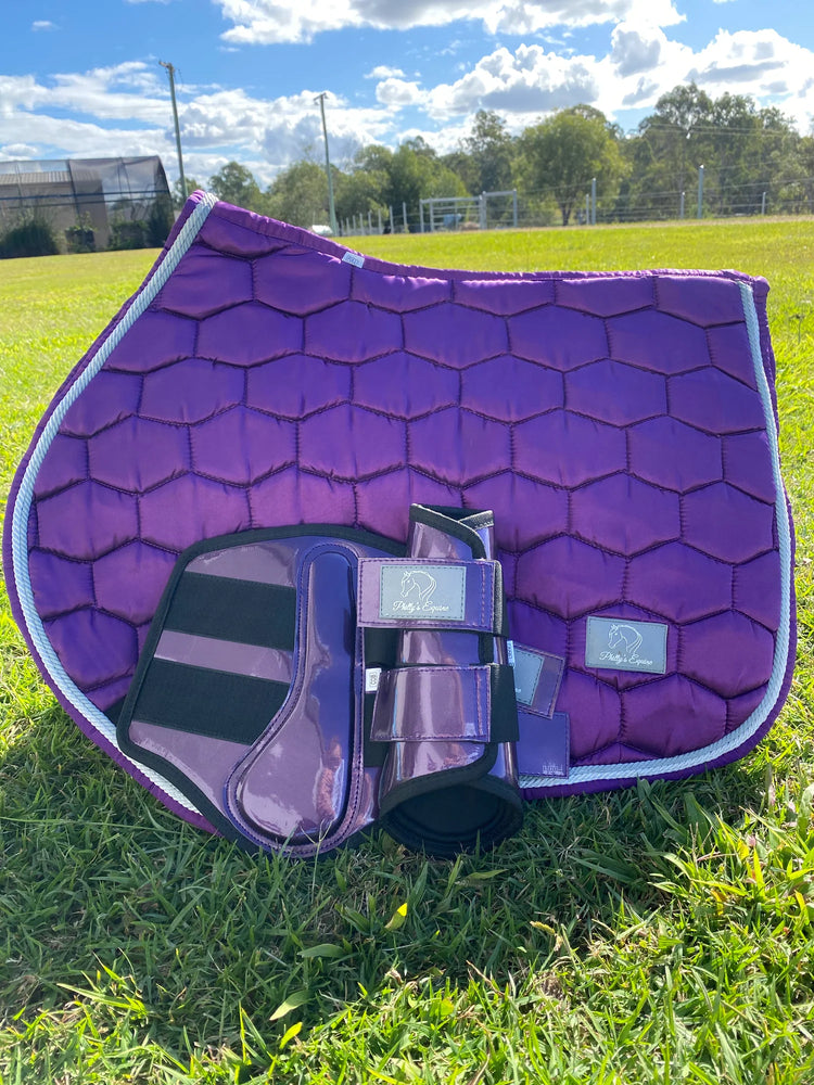 Purple jump saddle pad with matching brushing boots set