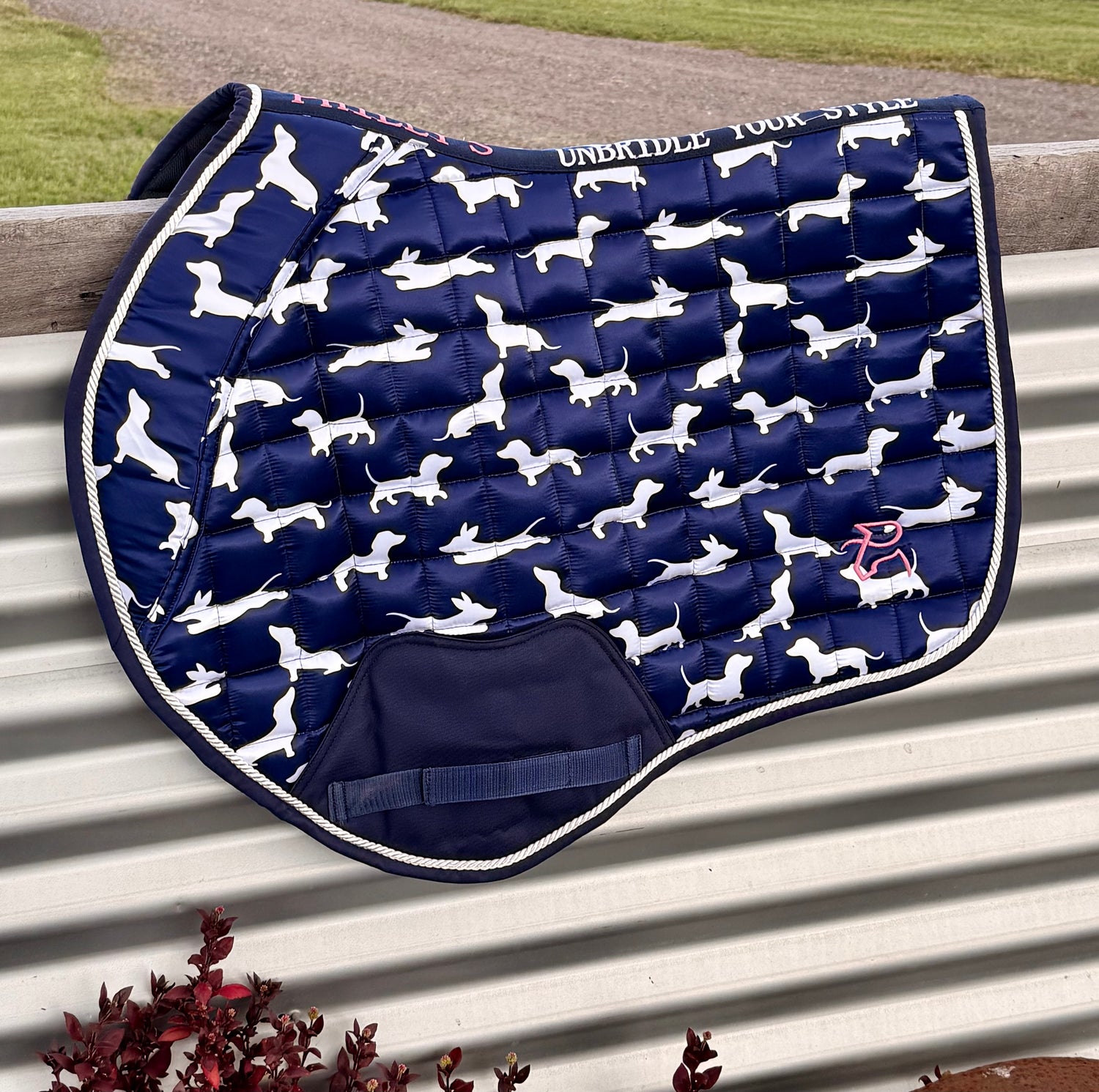 The Snag jump saddle pad detail with Unbridle Your Style binding