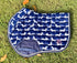 The Snag navy dachshund-print jump saddle pad, flat lay