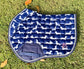 The Snag navy dachshund-print jump saddle pad, flat lay