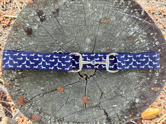 Bit belt flat-lay with breeches and saddle pad