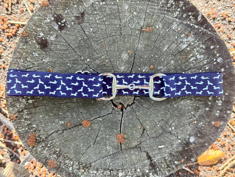 Bit belt flat-lay with breeches and saddle pad