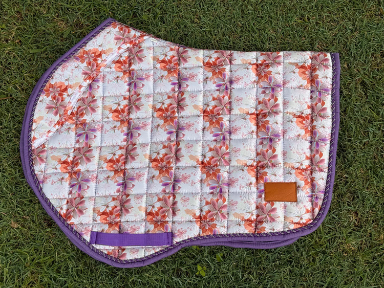 Spring Bloom floral jump saddle pad on white background