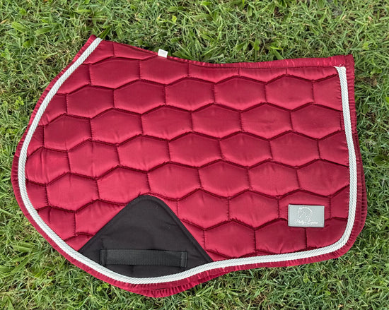 Burgundy honeycomb-quilted jump saddle pad with white trim