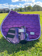 Purple jump saddle pad with matching brushing boots set